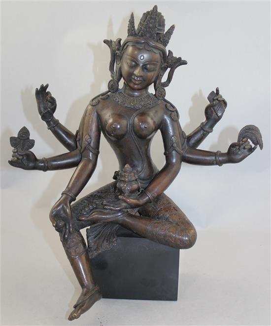 A large Nepalese bronze figure of Vasudhara, 19th century, 34.5cm